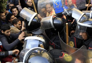 Riot police clash with protesters in Cairo